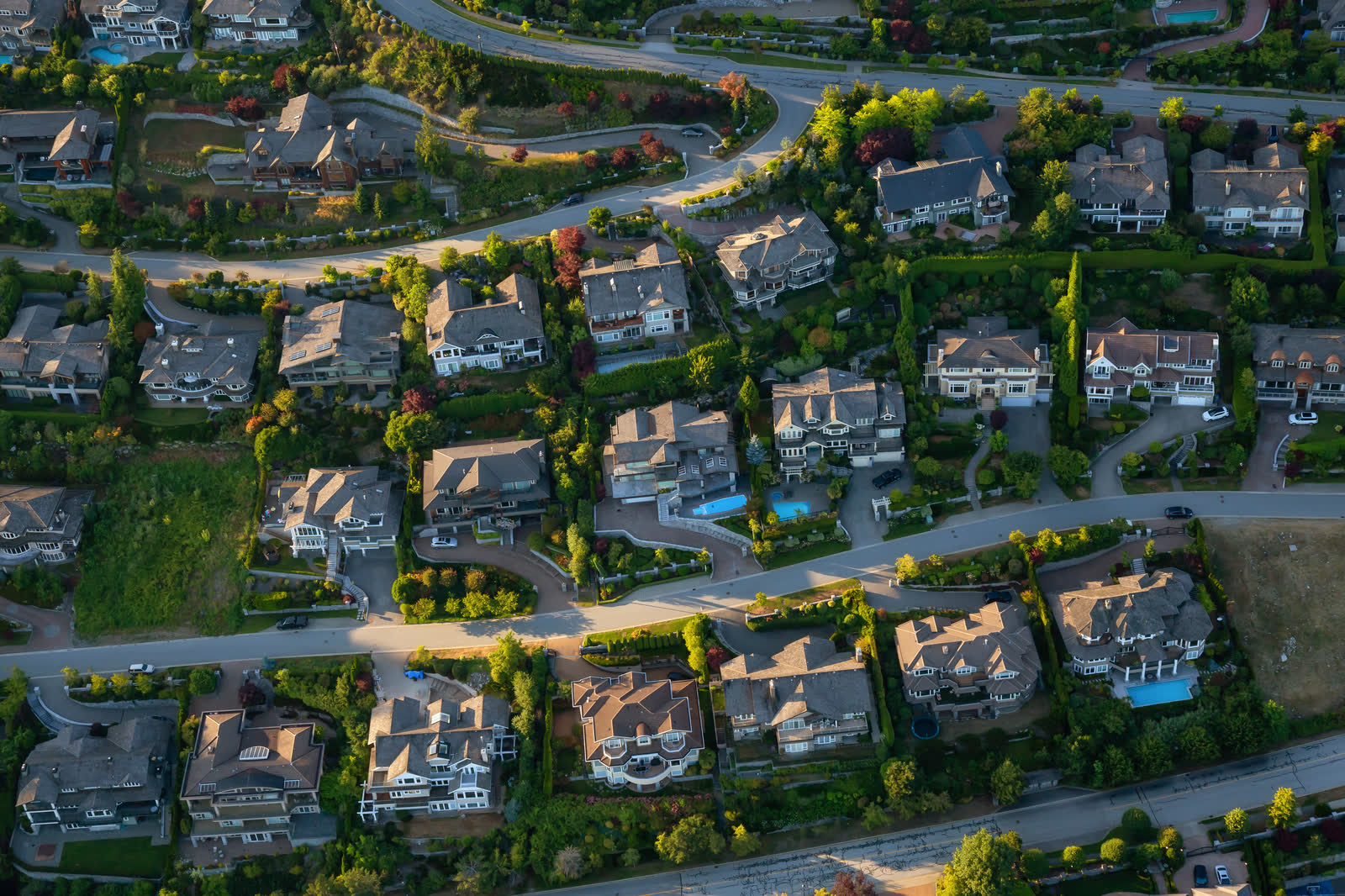 Aerial view of large homes on a hillside