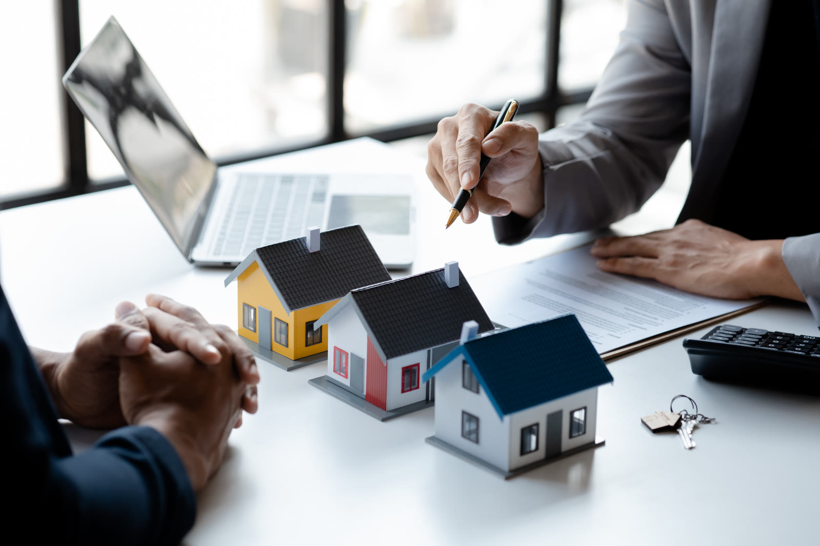 Architectural housing models on a presentation table